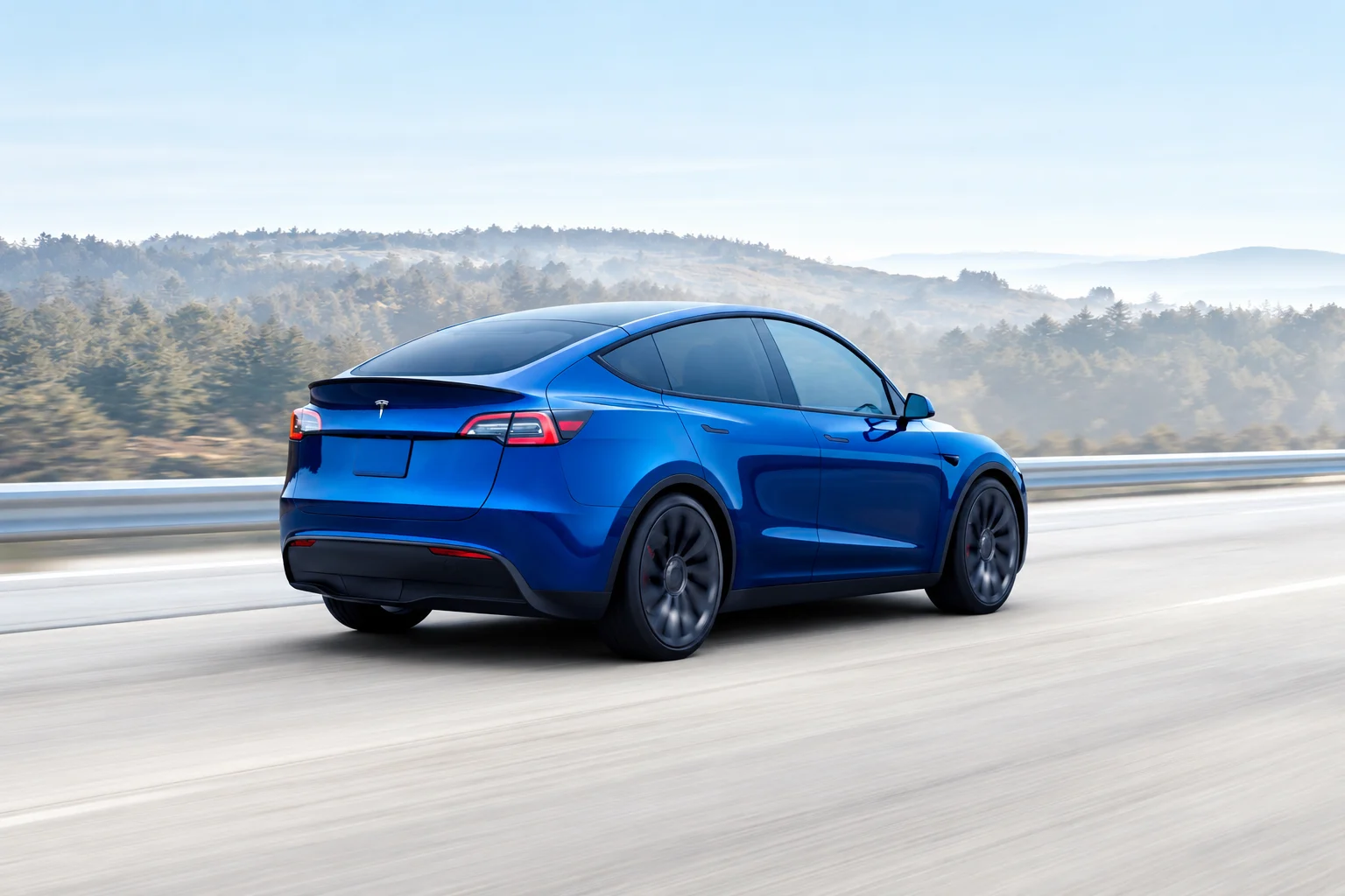 Blue Tesla Crossover Through Misty Hills